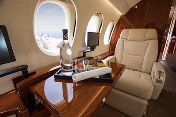 Enjoy the view from a private jet in the mountains of Switzerland