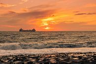 Sunset Westkapelle with a boat on the horizon by Rick van de Kraats thumbnail