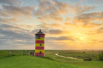 Pilsum lighthouse in East Frisia at sunrise by Michael Valjak