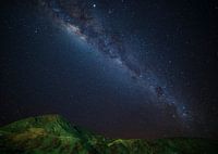 Milky Way over green mountains