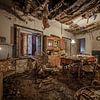 Expired dining room in abandoned house by Inge van den Brande