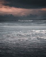 SUP boarders in the waves