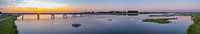 Panoramisch uitzicht over een brug over het Reevediep meer bij zonsondergang van Sjoerd van der Wal Fotografie thumbnail