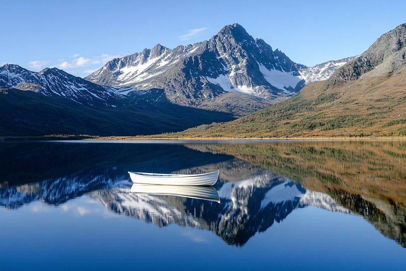 Quiet mountain lake with boat by Art & Soul Creations