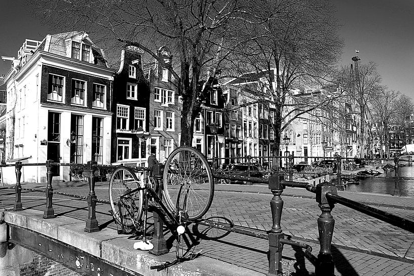 Upside down bicycle at the canal in Amsterdam by STUDIO VAN DE VEN & CO