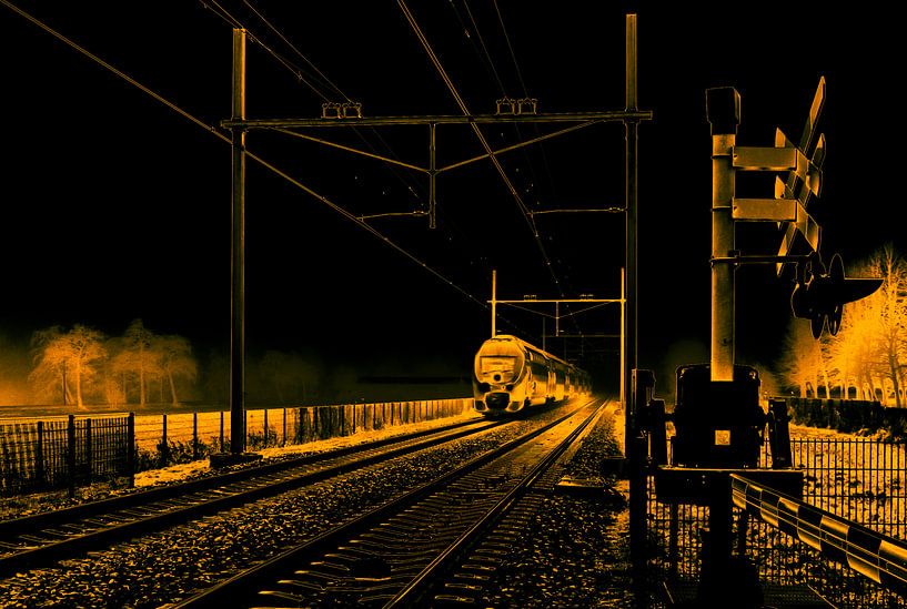 A typical Dutch train comes out of the fog and passes a railway crossing by Hans Post