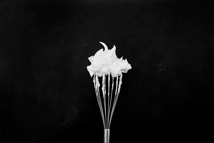 Foam on a whisk by <span class="secondary-font">Corrine Ponsen</span>