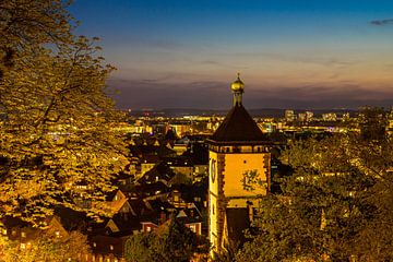 Freiburg im Breisgau Swabian City Gate by night by adventure-photos