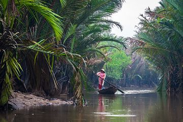 Rudern im Regen im der Mekong-Delta, Vietnam
