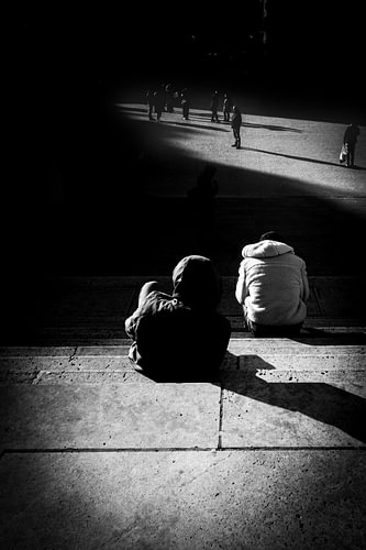 Between light and shadow