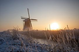Winter image with mill Leeuwarden by Berend Drent