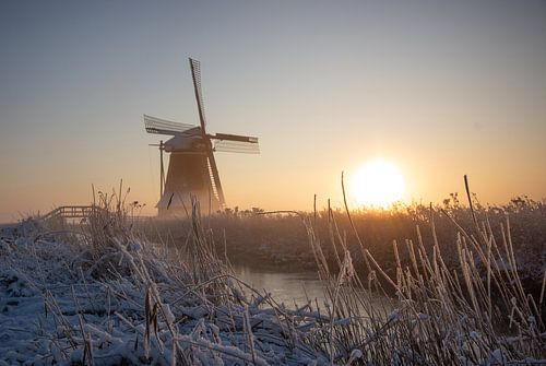 Image d'hiver avec le moulin de Leeuwarden sur Berend Drent