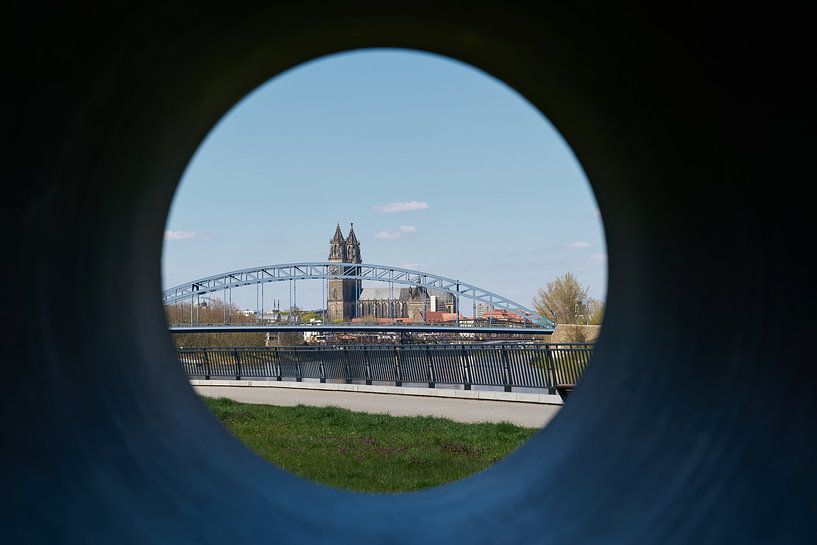 City view of Magdeburg through a hole by Heiko Kueverling