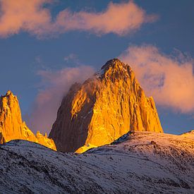 Mountain range with the steep peak of Cerro Fitzroy in Argentine Patagonia at sunrise by Chris Stenger