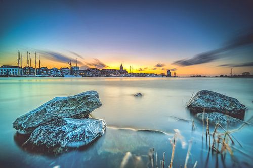 View of the city front of Kampen from the IJssel at sunset