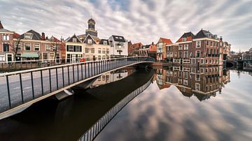 Magnificent view of the city of Leiden with a beautiful cloud cover above it by Jolanda Aalbers