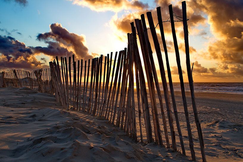 Beach fence on the beach by Marcel Verheggen