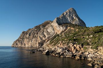 Cove and cliffs at Peñón de Ifach in Calpe by Adriana Mueller