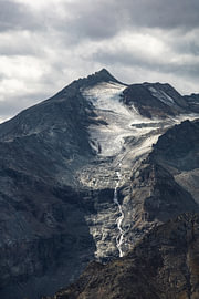 View of the melting Gran Paradiso glacier in the Italian Alps (portrait orientation, colour) by André Blom Fotografie Utrecht