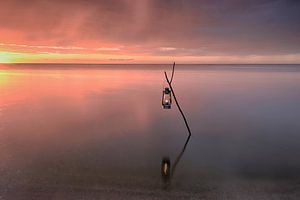 Oil lamp in the water by John Leeninga