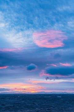 Winter sunset on the coast of Finnmark in Norway by Rico Ködder