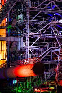 Steel structure illuminated at night in Landschaftspark Duisburg-Nord