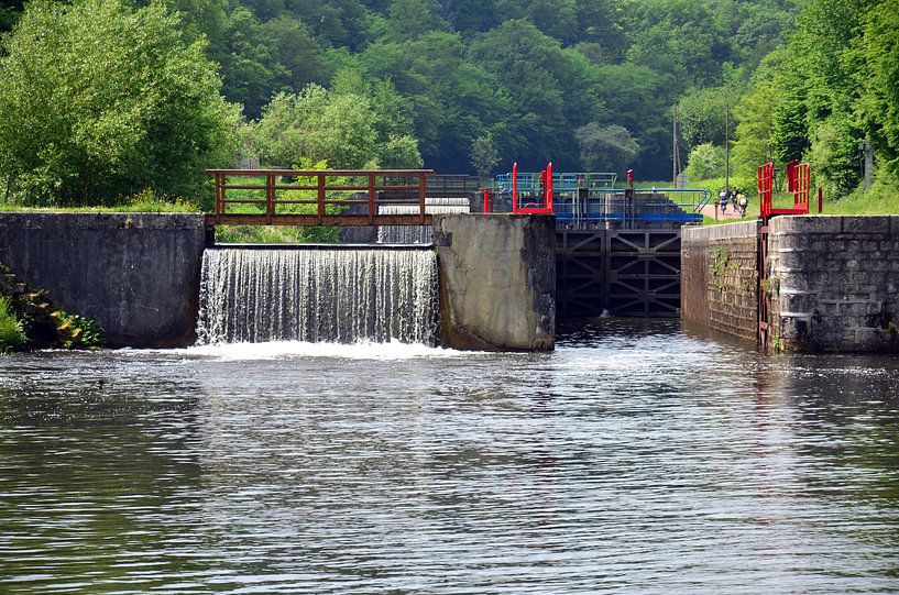 Weir with lock and lock gate in the river Yonne in Burgundy, France by Gert Bunt
