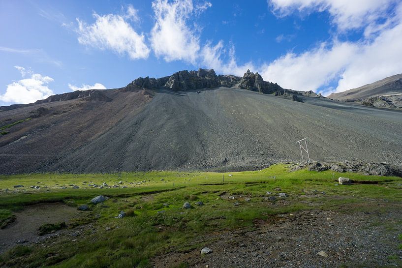 Iceland - Volcano with green meadow, blue sky and some clouds by adventure-photos