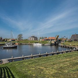 The entrance of the old inner harbour of Workum on a quiet spring day by Harrie Muis