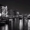 Photo du soir d'Amsterdam avec vue sur le Carre et le canal sur W J Kok