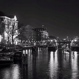 Evening photo of Amsterdam with view on Carre and canal by W J Kok