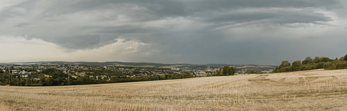 A thunderstorm over a rural landscape