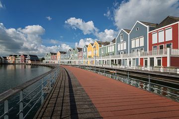 Des maisons en bois colorées sur Linda Lu