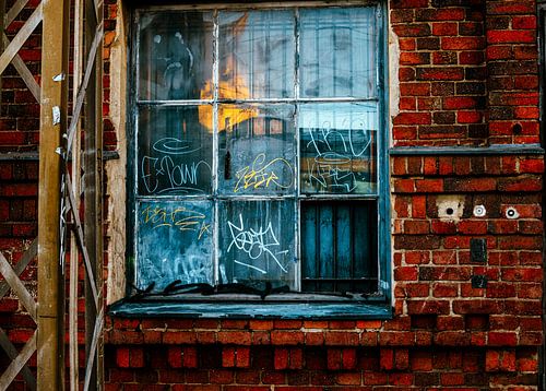 Brick & Patina – Tagged Window with Turquoise Sill