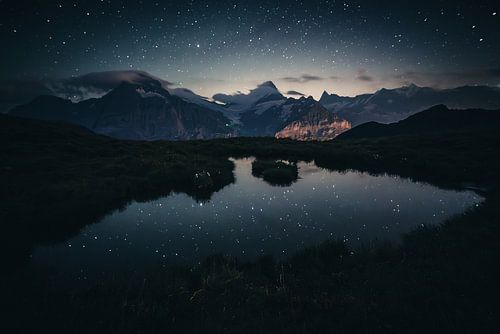 Starry sky with Swiss mountain landscape by Hidde Hageman