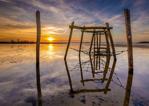 Sunrise on the beach of Midwolda. by Arjan Battjes