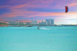 Water sports on Palm Beach on Aruba at sunset by Eye on You