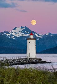 Close to full moon above the Høgstein lighthouse, Godøy, Norway by qtx