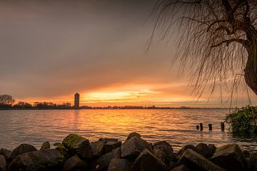 zonsondergang boven het meer van Johan Honders