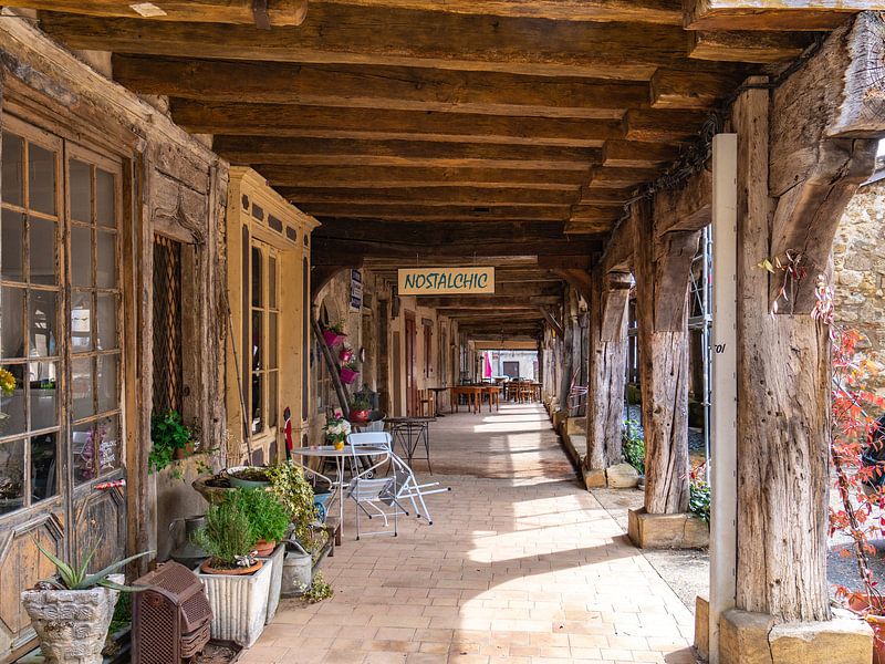Covered square in Bassoues in the Gers by Martijn Joosse