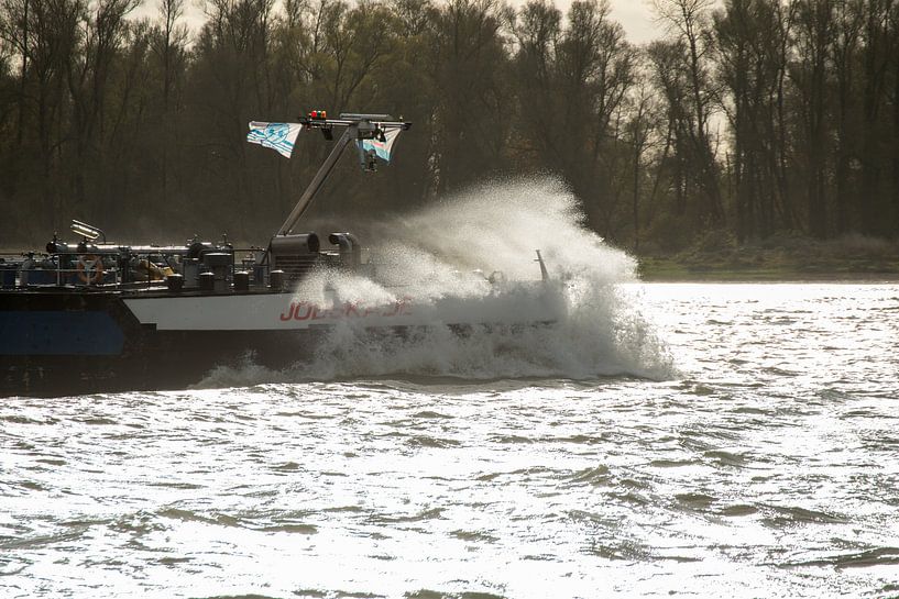 Barge with a storm on its bow by scheepskijkerhavenfotografie