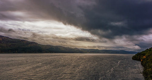 Urquhart Castle on the famous Loch Ness lake in Scotland. Beautiful scenery in a tranquil atmosphere. Silence, peace and solitude.