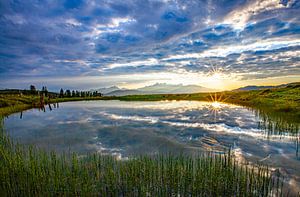 Wolkenspiegelung im Teich der Lackenalm