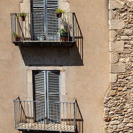 two balconies with light blue Louvre doors by Sandra Hogenes