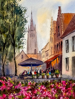 Zomeravond bij een café op het Walplein in Brugge
