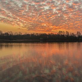 Sunrise with sheep clouds above lake by Mike Maes
