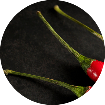 Detail van 3 rode pepers van Mister Moret