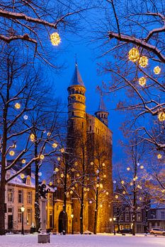 Our Lady Church in the blue hour with snow and Christmas lights