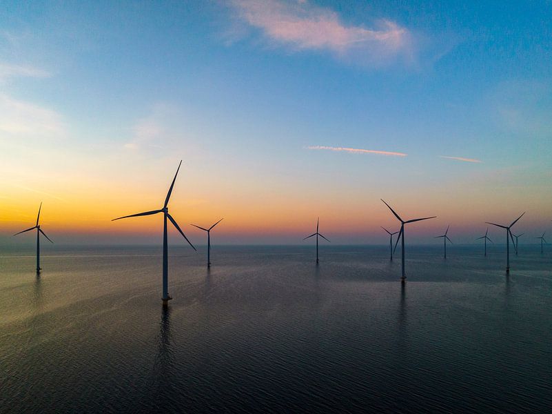 Wind turbines in an offshore wind park producing electricity by Sjoerd van der Wal Photography