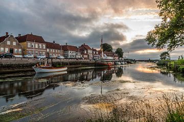 Sunset with threatening sky in Ribe, Denmark by Gijs Rijsdijk